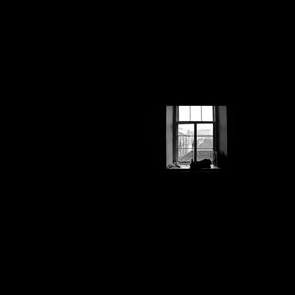 window to outside world from dark room