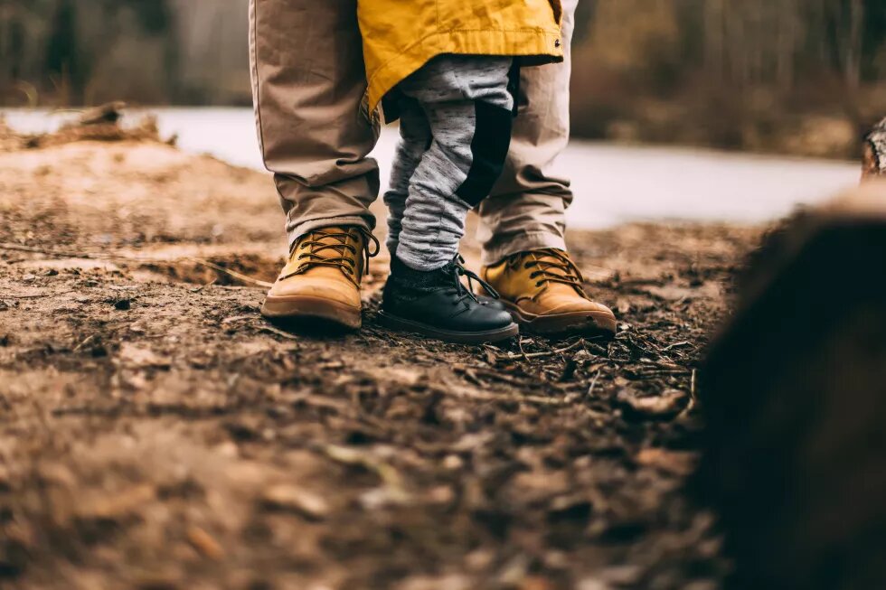 Feet by parent with child