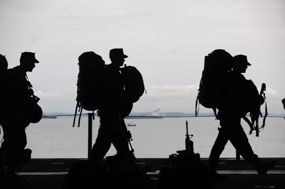 soldiers with backpacks