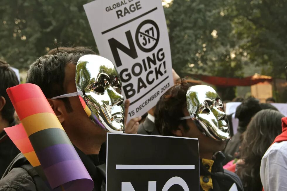 Protesters against 377 wearing silver masks in Delhi