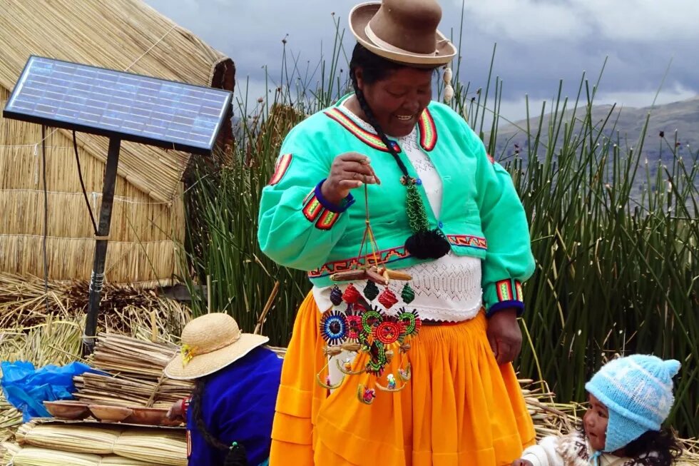 Locals, Uros Floating Islands, Lake Titicaca, Peru, South America