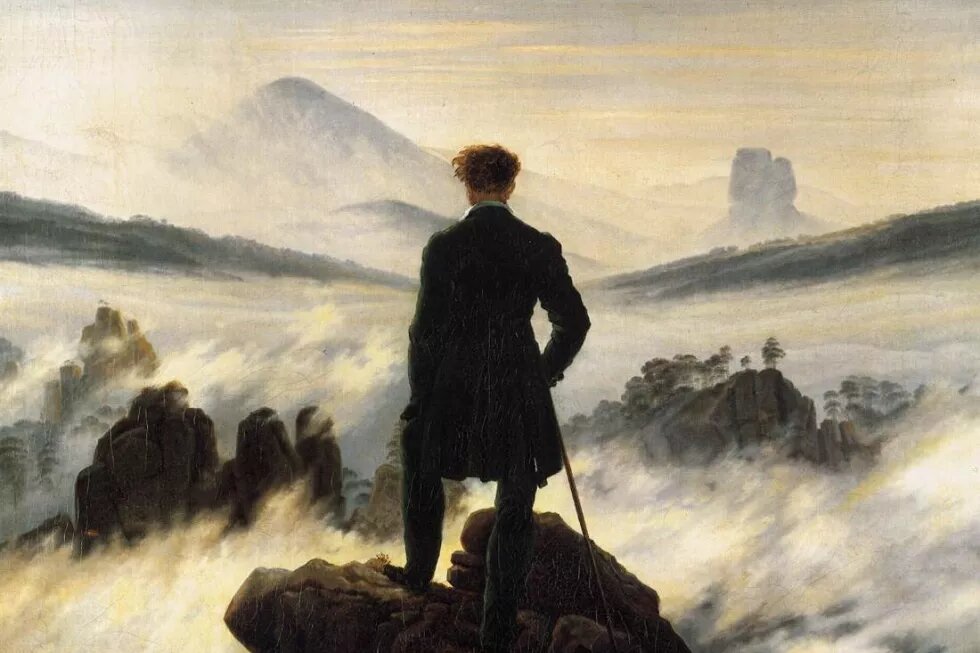 Ein Gemälde des Malers Caspar David Friedrich: Ein Mann blickt über ein Meer an Wolken.