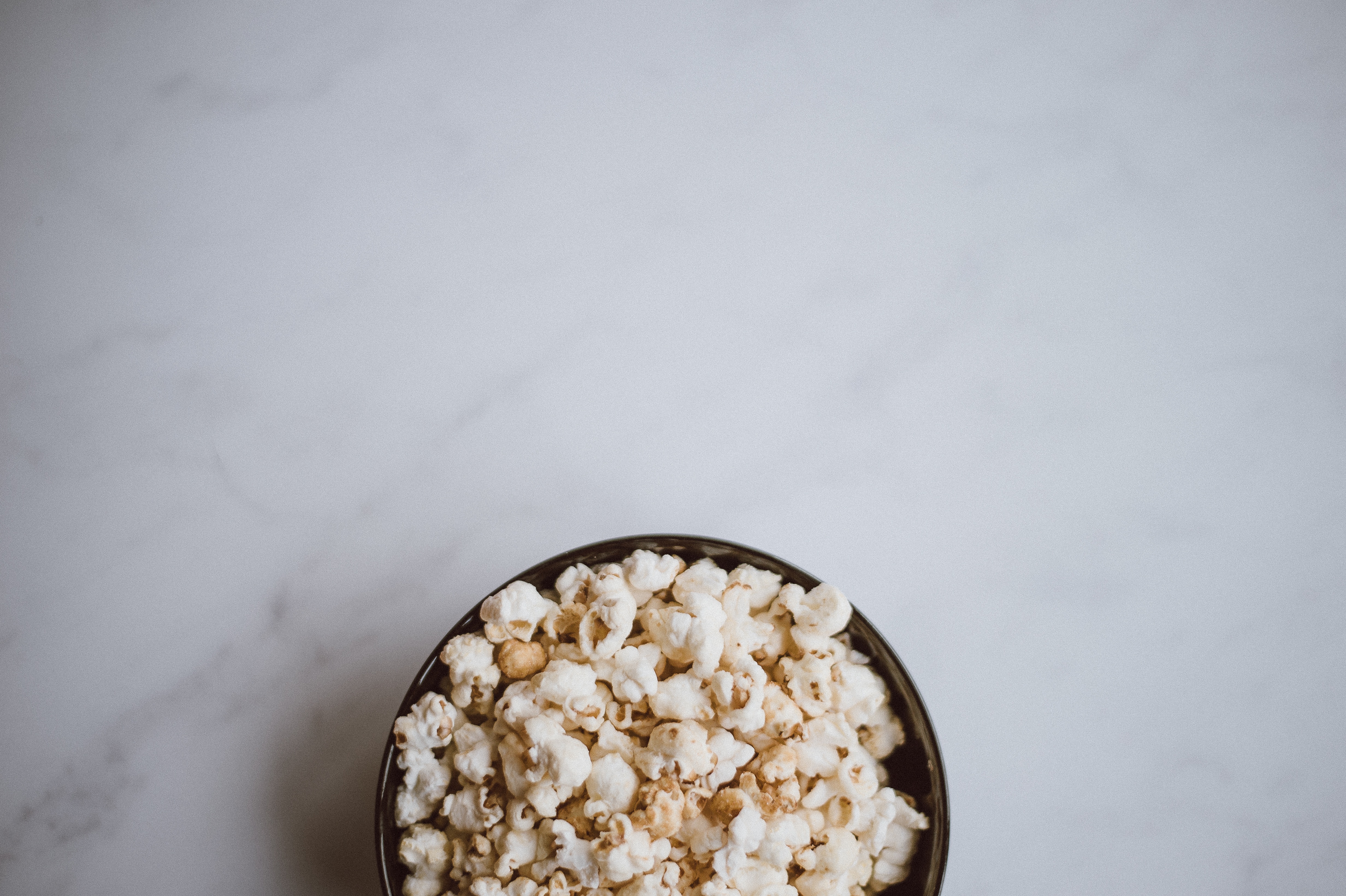 Popcorn Eine Schüssel mit Popcorn